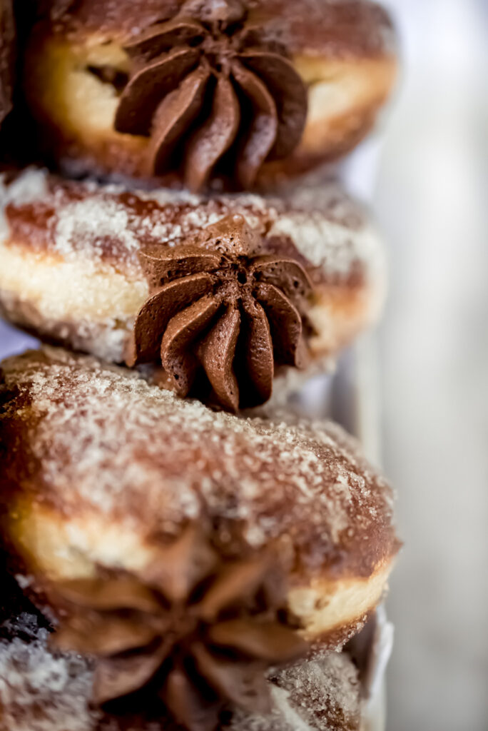 Brioche doughnuts- The perfect marriage of a classic American dessert and French brioche, filled with whipped dark chocolate ganache.